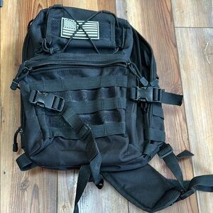 Black Tactical Backpack with MOLLE System and Adjustable Straps